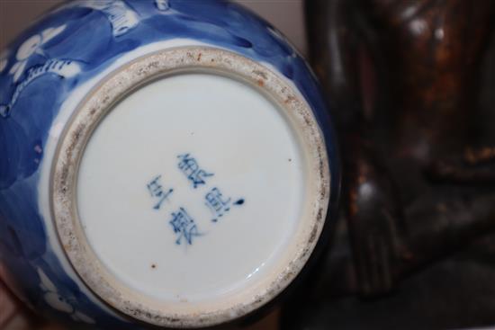 A pair of 19th century Chinese blue and white double gourd vases, Kangxi mark height 25cm